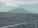 the view from Libertad in Loweleba anchorage; saw many a volcano as we cruised Indonesia