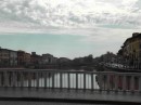On the bridge crossing the Arno River.