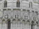 Busts of saints and/or apostles adorn the exterior of the Baptistery of St. John.