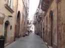 Siracusa: Typical narrow street with balconies galore.