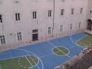 Dubrovnik: School yard combination basketball court and short soccer field.