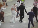 Zadar: The happy couple followed by a large group of well-wishers.