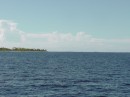 enroute to the southern pass of Apataki; note how the profile of the atolls differ so much from the Marquesas islands - very low