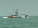 the fishing boats come in all shapes and sizes