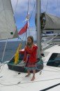 Zoe putting up the ensign and the Q flag