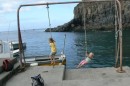 swinging on the ropes at the harbour wall - the girls saw these and immediately thought they were kid
