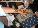 Ange getting a henna tattoo