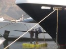 Washing the bow of a megayacht, Porto Montenegro