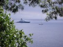 Egret dwarfed by a 64m motor yacht, Ambrym 