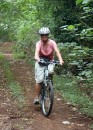 Cycling through the dense woodland