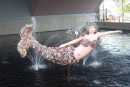 Mysterious mermaid sculptures pop up to point the way