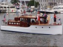 Parade of vintage motor boats