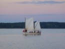 An open lugger from the Outward Bound School sailed into Maple Juice Cove