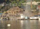 Jetty for pearl farm with steam rising from hot spring behind
