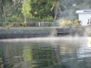 Leaving SavuSavu. Early morning so you can see the steam rising from the hot springs that run out into the sea