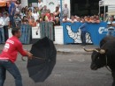 Bullrunning in streets. Any one can try their luck (or skill) against the bull. This is known as the umbrella pass (yes really)