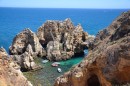 Spectacular coast line here.  All kinds of boats travel too and from these grottos full of people out for day trips.