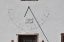 A sundial located on the farmstead building