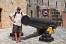 Reg beside a cannon - the pyramid of balls on the other side is called a brass monkey - hence the expression - it is sold cold it would freeze the balls of a brass monkey - this means the brass would shrink and the balls would pop of!!!