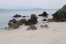 Empty nudist beach on Isla Ons.
