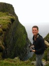 Chris at the edge of the highest cliffs on Mingulay. We could see nesting sea birds from this awesome place.