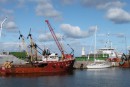 Canty at the wharf at Buckie. The crane is off-loading salt/sand.