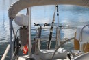 In the harbor at Ebeltoft. Note the US ensign is about 6 inches short. It no longer reaches the exhaust for the Espar heat so no more flag burning. Nice stitching by Marty.