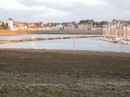 The beach and a causeway at the shallow end of the Bas-Sablons marina in St. Malo