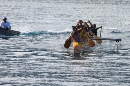 Outrigger canoe team practicing.