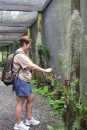 Juli taking pictures at the orchid garden.