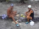 Claude and Ronel preparing dinner , making coconut milk for the fish