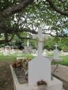 cemetery with fresh leis on graves