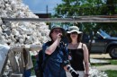 Mark and Trina. In the background is a pile of conch shells