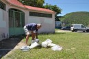 Filling our water containers in Deshaies, Guadaloupe. We drink it straight from the hose and hope for the best.....