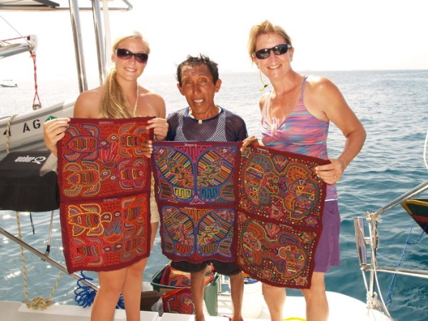 Local Kuna Indian successfully completing sale of Molas