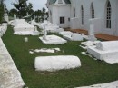 Historic old church with above-ground graves.