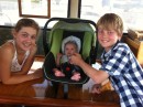 Daisy & Skagen Fielding with their baby 2nd cousin Joshua Dures in the saloon of Jepeda IV at GCCM, Coomera