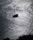 Jepeda IV in silhouette whilst riding to anchor in Jetty Bay, Cape Capricorn. 10-7-12
