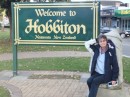 Dominique hits her head in a Hobbiton seat.  The actual town name is Matamata.