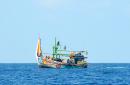 Fishing Boat: One of the many colourful Indonesian fishing boats we passed along the way