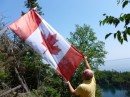 And the Captain honoring the Canadian flag atop Thompson Island.