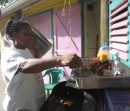 Fast food restaurant in St. Lucia, what would you like?  Barbequed chicken or chicken or would you like barbegued chicken?