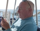 The captain checking the internet some 15 or so miles offshore, amazing, so easy