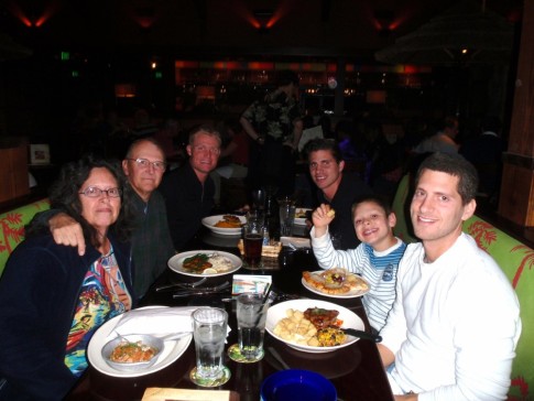 Our 2 sons and grandson on the right at a birthday dinner for Michael (in th back)