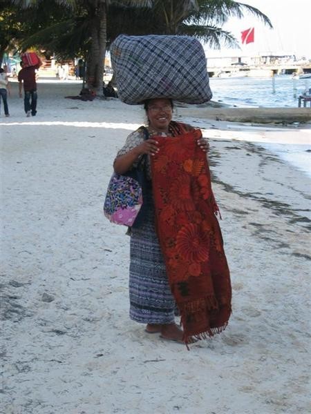 Mayan women selling hand woven items