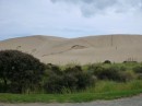 The sand dunes at the far N of the island rise several hundred meters