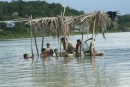 On a boat trip around Lake Peten Itza near Tikal we saw these women washing thier clothes in the lake,  a common site.