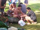 Samoan pig: The single men prepare meals