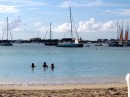 Jack, Jonas and Carol swimming in Simpson Bay.  Lovely backdrop of anchored boats!