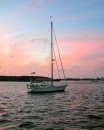 s/v Nimue looking magnificent against a cotton candy sunset.